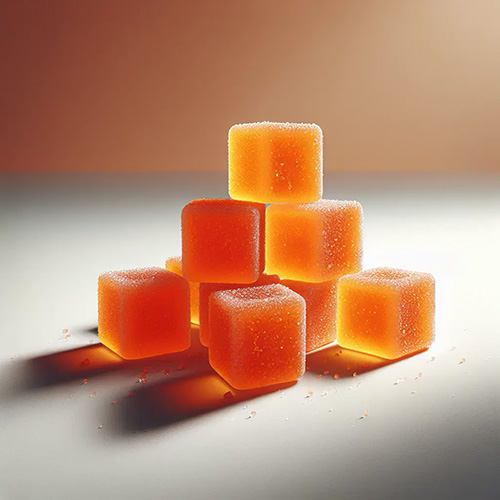Tangerine CBC gummies stacked—25mg CBC per gummy